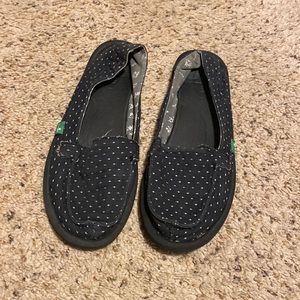 Black with white slip-ons